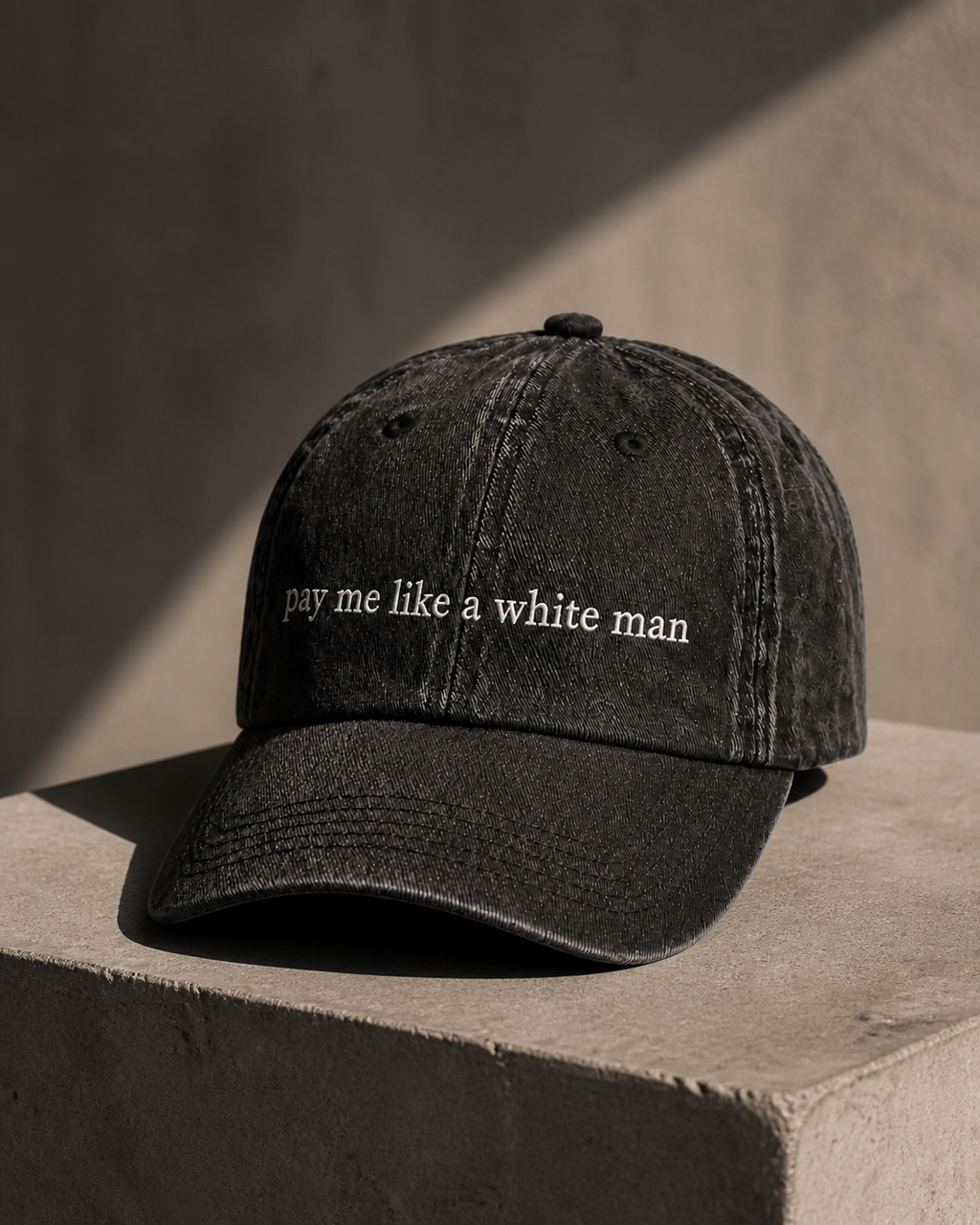 Pay Me Like A White Man cap — washed cotton dad hat with “pay me like a white man” embroidered in white, product shot