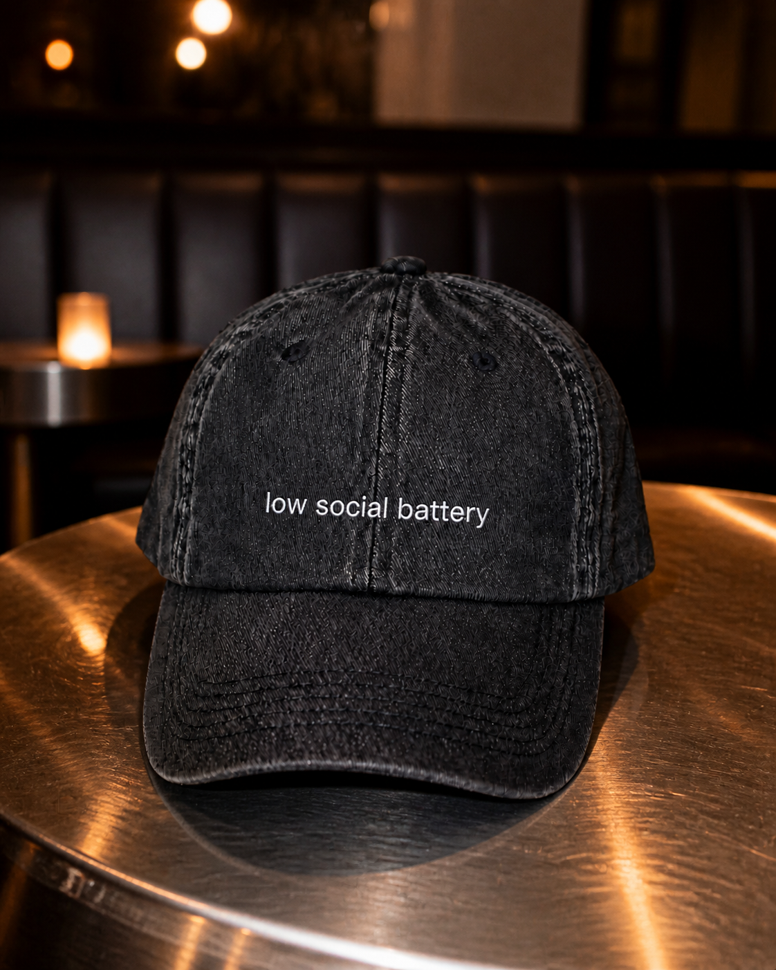 Low Social Battery cap in black — washed cotton dad hat with “low social battery” embroidered in white, worn