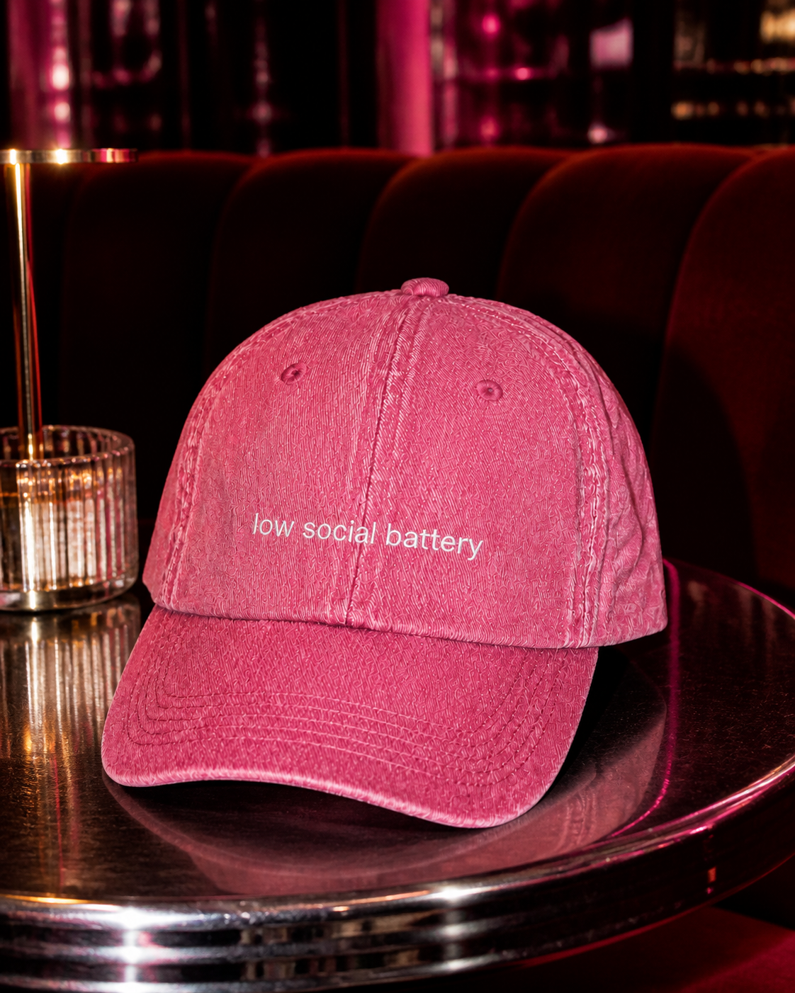 Low Social Battery cap in dark pink — washed cotton dad hat with “low social battery” embroidered in white, worn