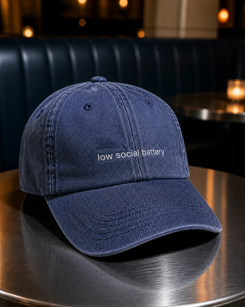 Low Social Battery cap in navy — washed cotton dad hat with “low social battery” embroidered in white, worn