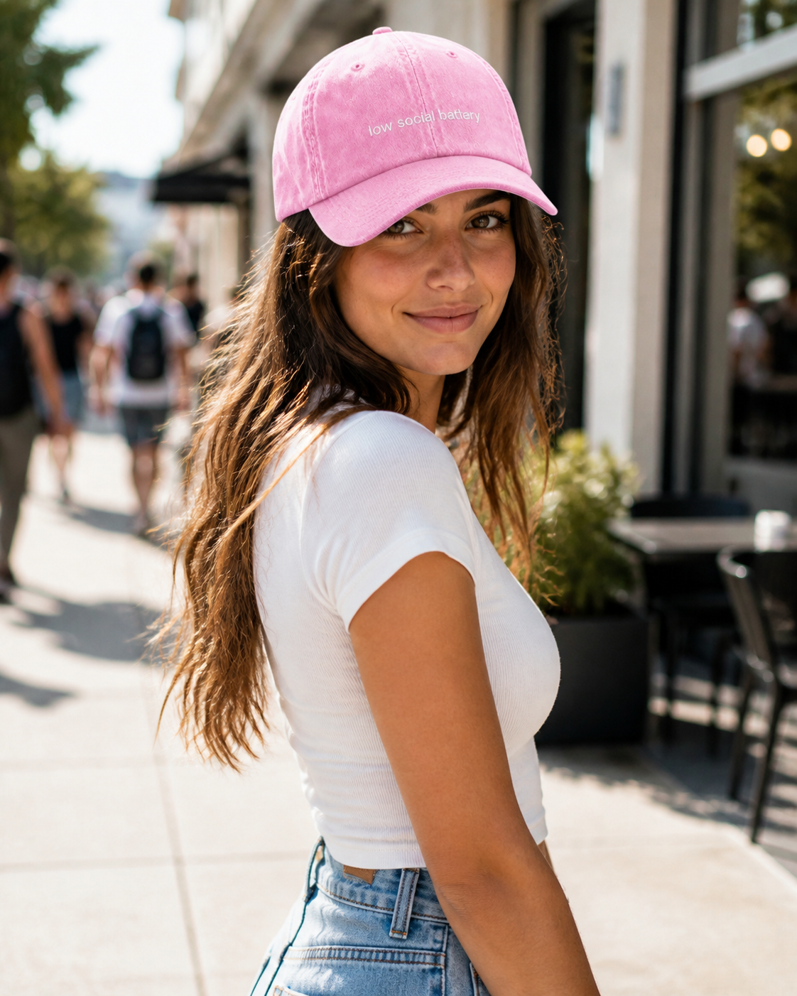 Low Social Battery cap in baby pink — washed cotton dad hat with “low social battery” embroidered in white, worn
