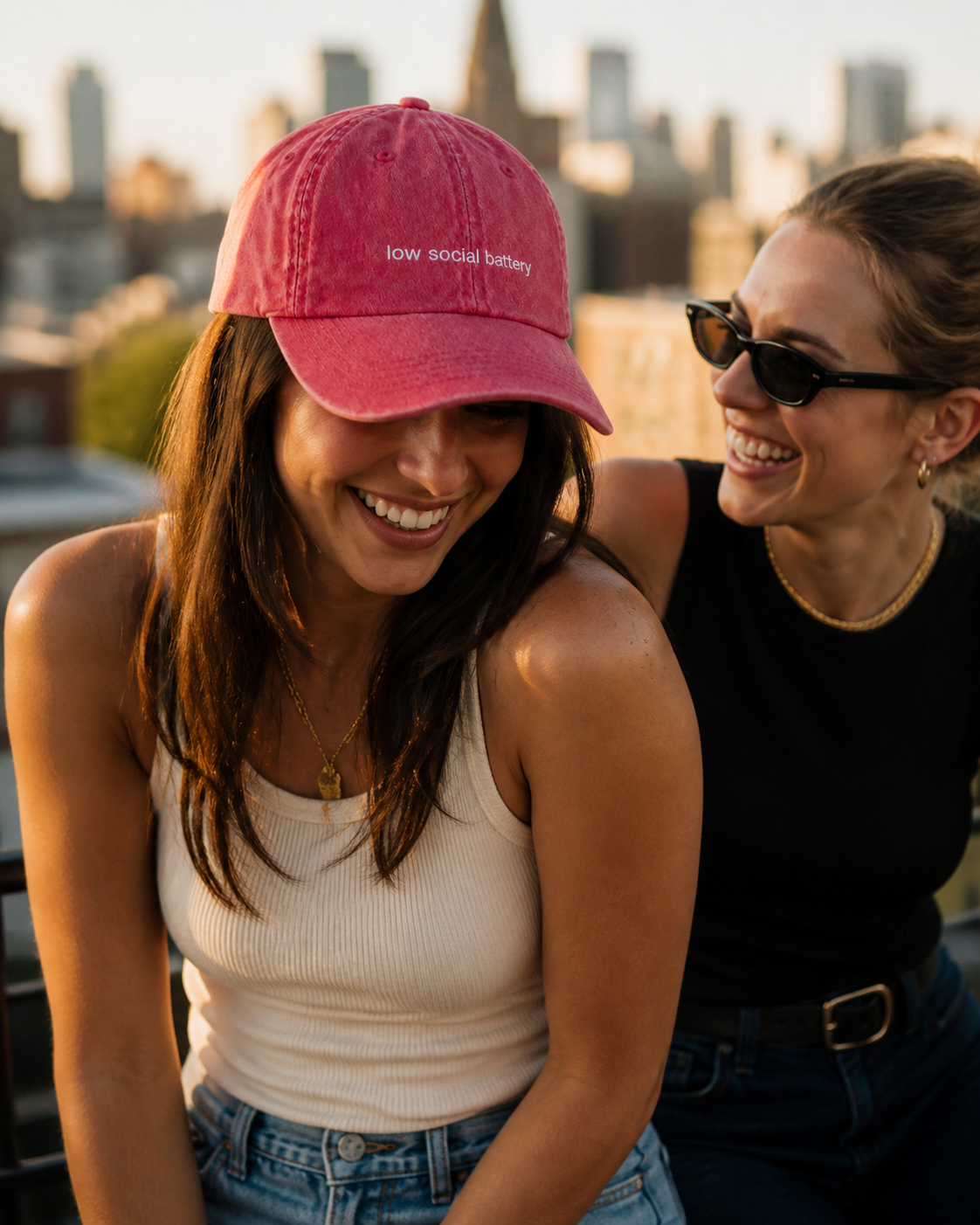 Low Social Battery cap in dark pink — washed cotton dad hat with “low social battery” embroidered in white, worn