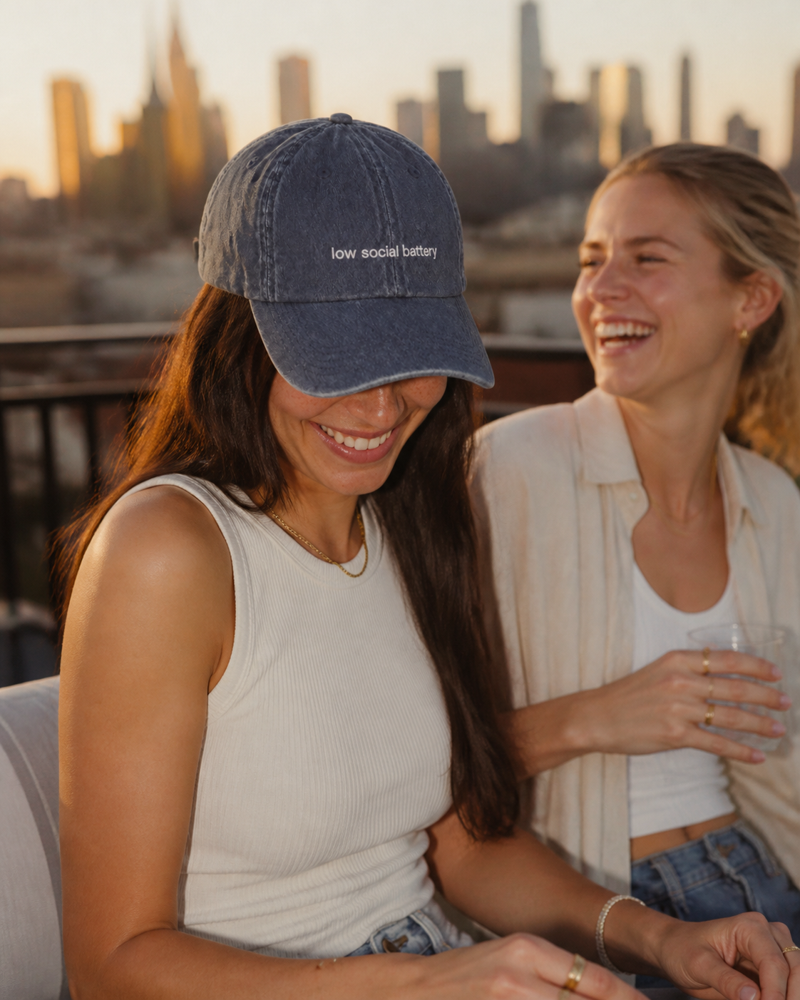 Low Social Battery cap in navy — washed cotton dad hat with “low social battery” embroidered in white, worn