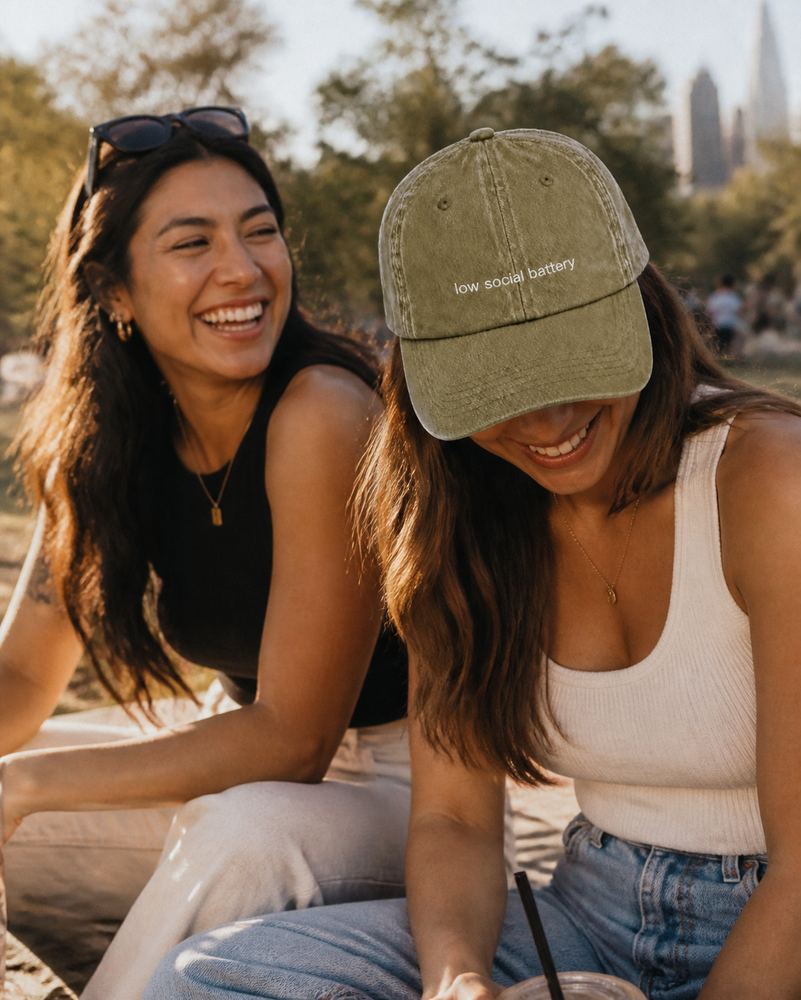 Low Social Battery cap in olive green — washed cotton dad hat with “low social battery” embroidered in white, worn