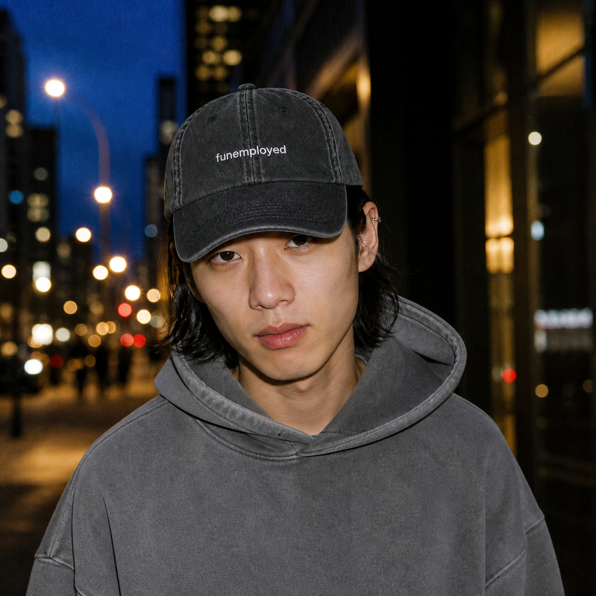 Funemployed cap in black — washed cotton dad hat with “funemployed” embroidered in white, worn