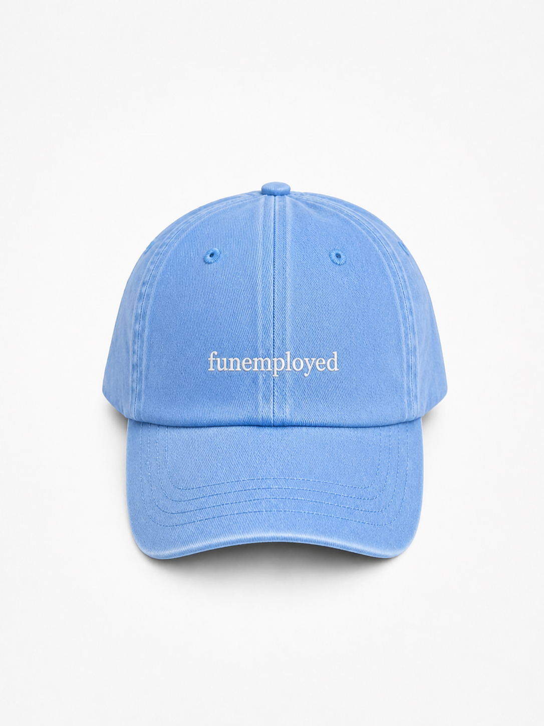 Funemployed cap in light blue — washed cotton dad hat with “funemployed” embroidered in white, product shot