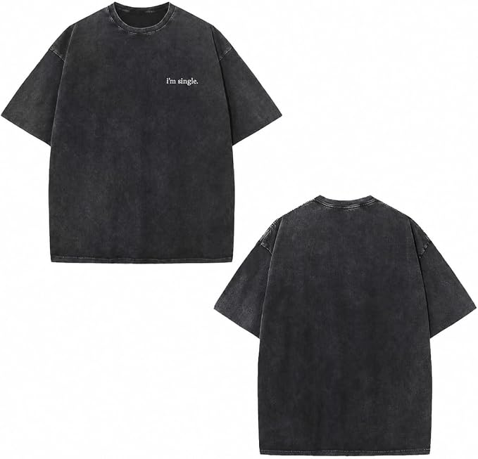 A washed black short-sleeve t-shirt shown from both the front and back views against a plain white background. The front features the small white text 'I'm single.