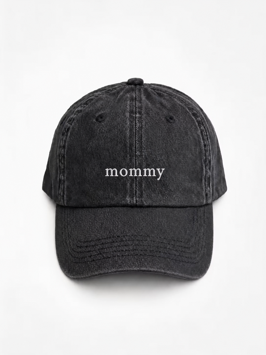 A washed black baseball cap with the phrase 'i'm single.' embroidered in white on the front, shown against a plain white background.