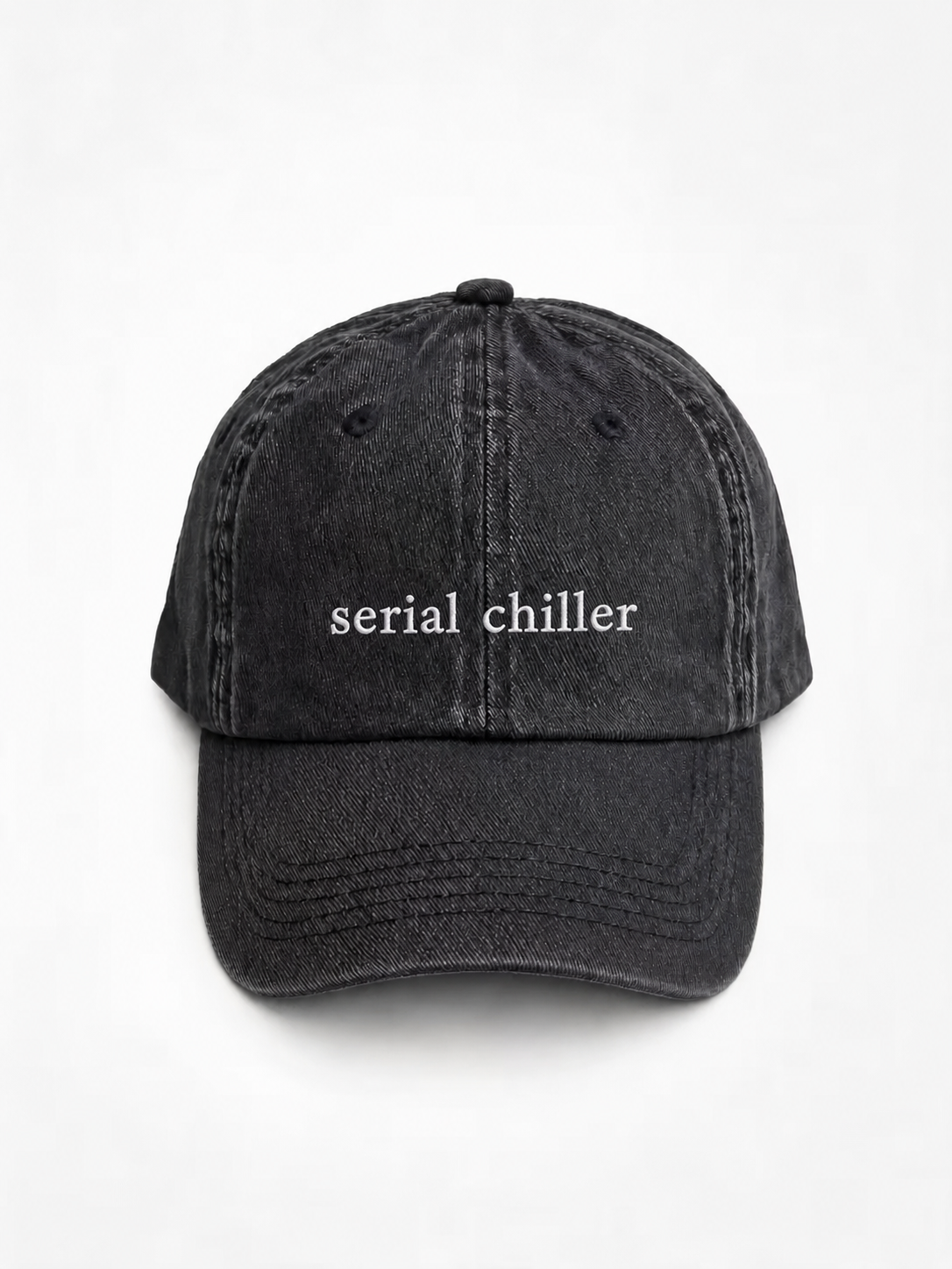 A washed black baseball cap with the phrase 'i'm single.' embroidered in white on the front, shown against a plain white background.