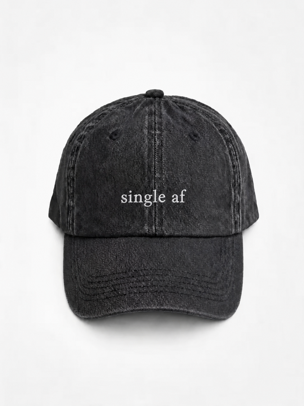 A washed black baseball cap embroidered with 'single af' in white, shown from the front against a plain background.
