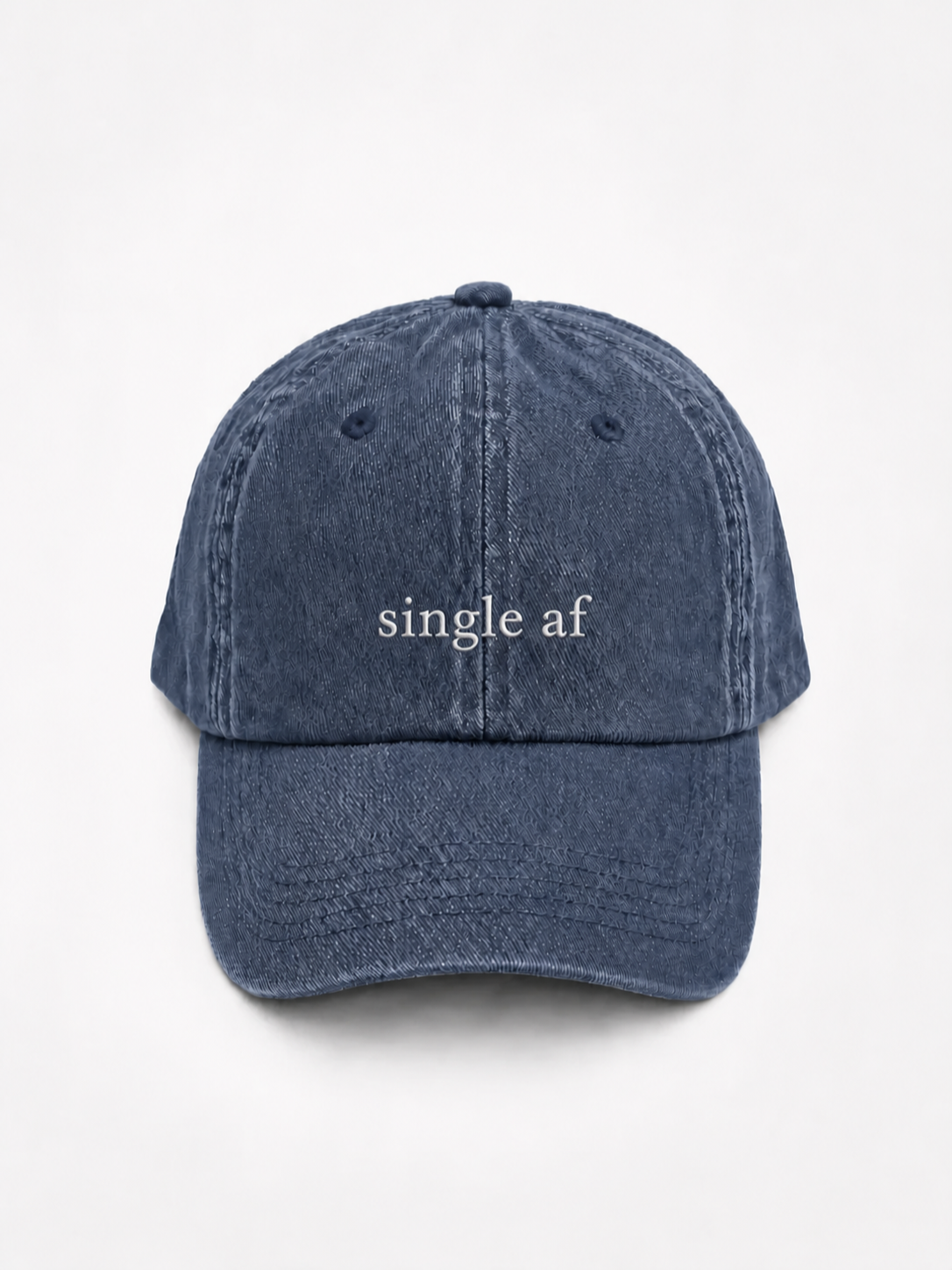 A navy baseball cap embroidered with 'single af' in white, shown from the front against a plain background.