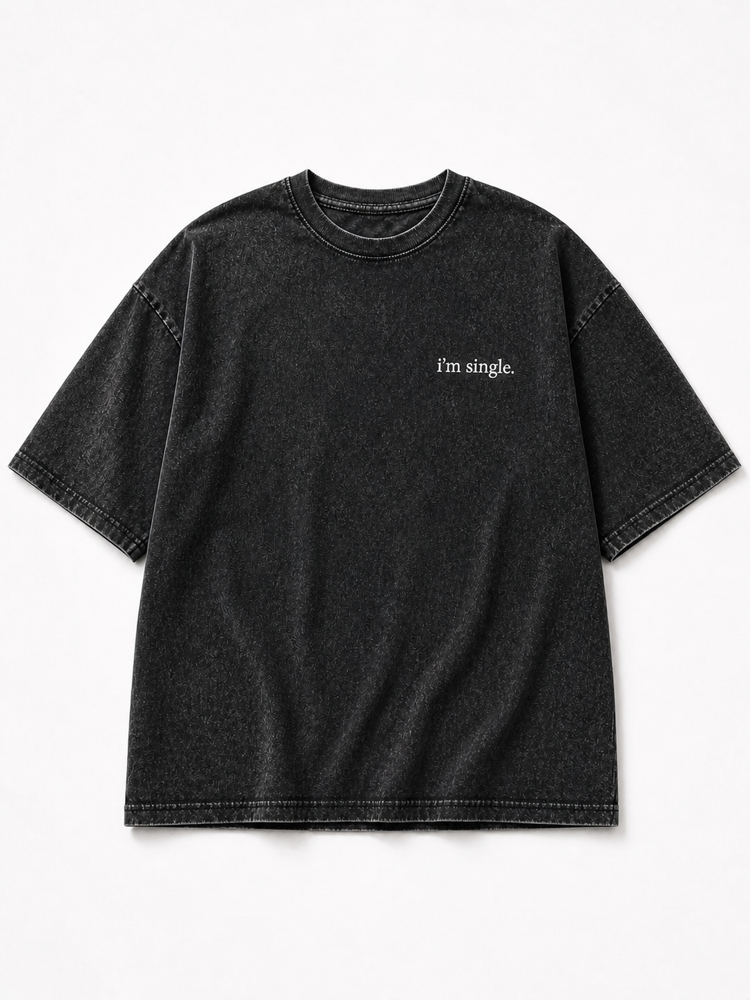 A black acid-wash short-sleeve t-shirt with 'i'm single.' printed in white script on the left chest, displayed flat against a clean white background.